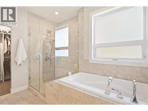 Shower and soaker tub at 1675 Willow Crescent Unit# 3 Lot# 3, Glenmore, Kelowna