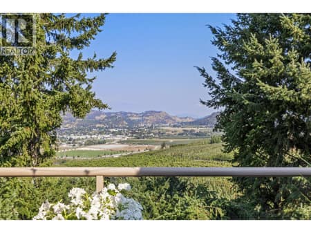 Upper and lower decks to enjoy unobstructed views over the valley and vinyards at 2300 Silver Place Unit# 3, Dilworth Mountain, Kelowna