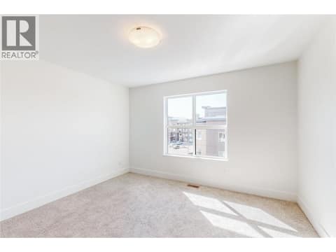 Similar too - Primary Bedroom at 720 Valley Road Unit# 43, North Glenmore, Kelowna