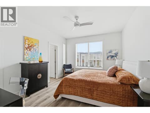 Similar Too - Primary Bedroom at 610 Academy Way Unit# 114, University District, Kelowna