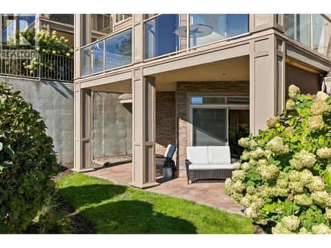 2 entrances to the large corner patio. at 3545 Carrington Road Unit# 108, Westbank Centre, West Kelowna