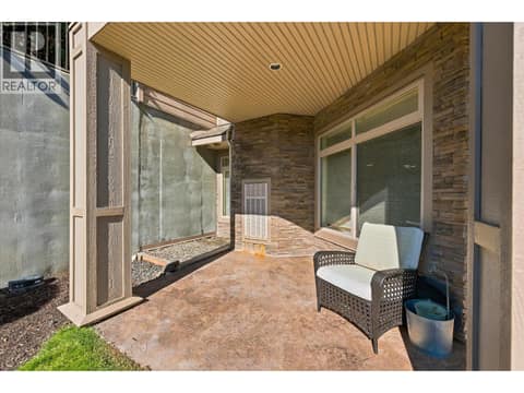 Extra large patio... at 3545 Carrington Road Unit# 108, Westbank Centre, West Kelowna