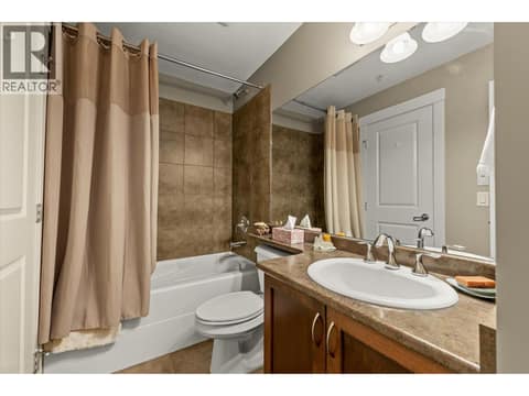Second bedroom ensuite with 2 entrances. at 3545 Carrington Road Unit# 108, Westbank Centre, West Kelowna