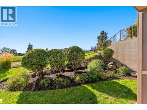 This landscaping is offering privacy and beauty. at 3545 Carrington Road Unit# 108, Westbank Centre, West Kelowna