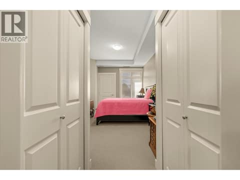 Walk through the double closets to the tandem ensuite. at 3545 Carrington Road Unit# 108, Westbank Centre, West Kelowna