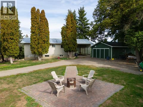 Perfect fire pit area at 3764 Creamery Road, Armstrong/ Spall.