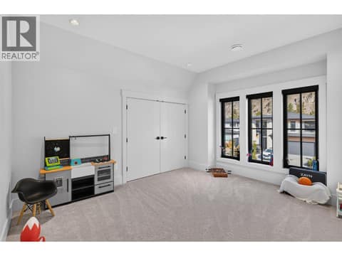 Fifth bedroom on upper level. at 1531 Cabernet Way, Lakeview Heights, West Kelowna