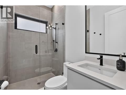 Full bathroom conveniently located beside the flex room. at 1531 Cabernet Way, Lakeview Heights, West Kelowna