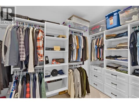 One of two spacious walk in closets in the primary suite. at 1531 Cabernet Way, Lakeview Heights, West Kelowna