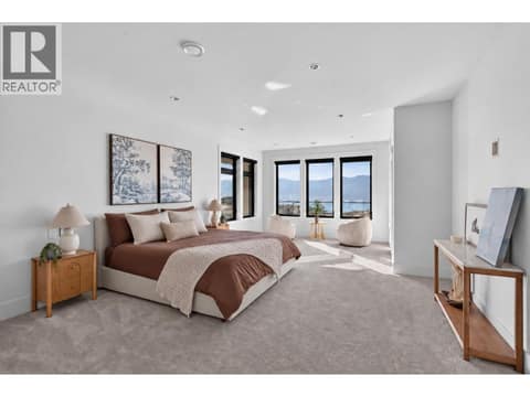 Spacious primary suite with stunning lake and mountain views. at 1531 Cabernet Way, Lakeview Heights, West Kelowna