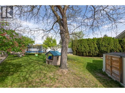 Left side at 1360 Elm Street, Glenmore, Kelowna