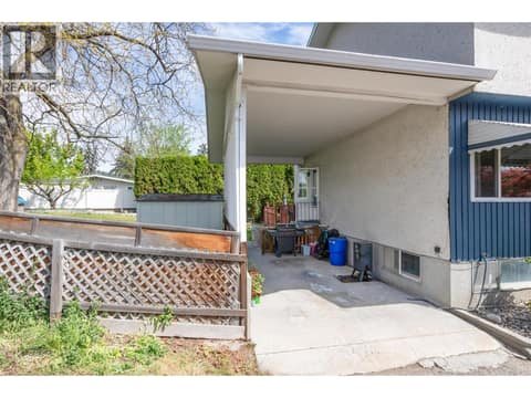 Left side carport at 1360 Elm Street, Glenmore, Kelowna