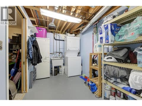Left side downstairs laundry at 1360 Elm Street, Glenmore, Kelowna