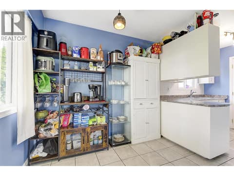 Left side kitchen at 1360 Elm Street, Glenmore, Kelowna