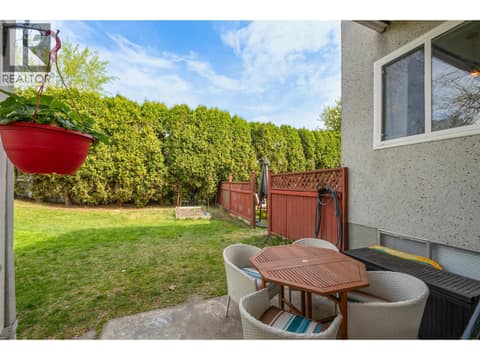 Left side patio/sitting area at 1360 Elm Street, Glenmore, Kelowna
