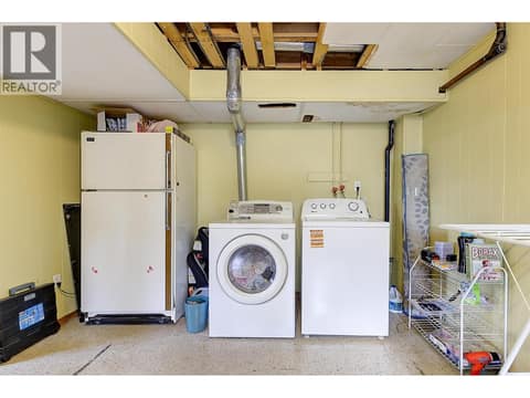 Right side downstairs laundry at 1360 Elm Street, Glenmore, Kelowna