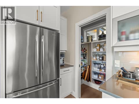 Kitchen to Pantry at 1666 Lakestone Drive, Lake Country South West