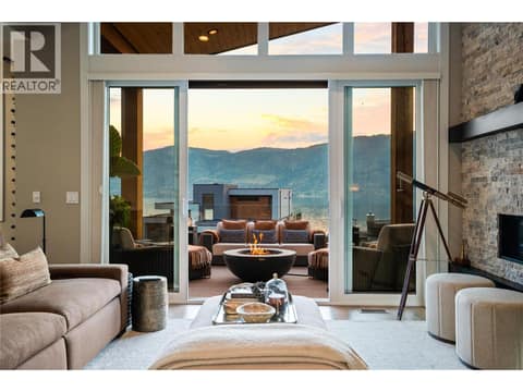 Living room at dusk at 1666 Lakestone Drive, Lake Country South West
