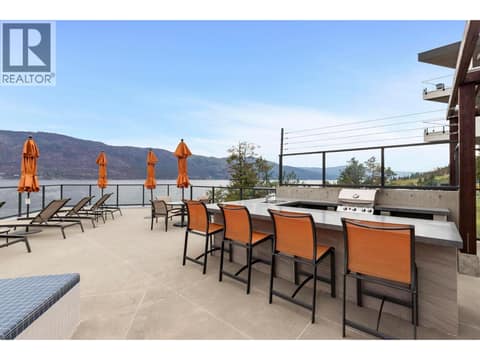 Outdoor BBQ area -Waterside Clubhouse at 1666 Lakestone Drive, Lake Country South West