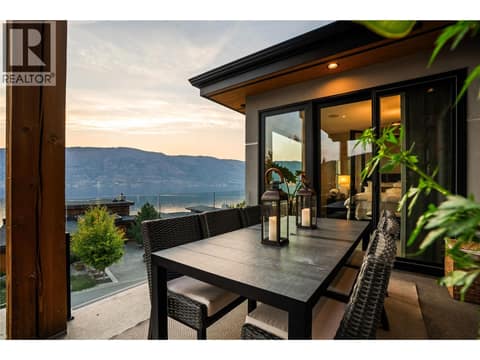 Outdoor dining at twilight at 1666 Lakestone Drive, Lake Country South West