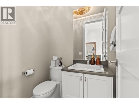Powder Room - Main Level at 1666 Lakestone Drive, Lake Country South West