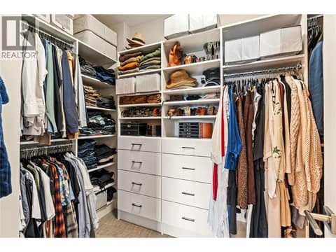 Primary Walk-in Closet at 1666 Lakestone Drive, Lake Country South West