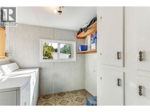 Laundry Room with additional storage at 1699 Ross Road Unit# 213, Lakeview Heights, West Kelowna