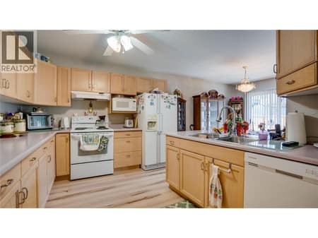 Functional Kitchen. at 3906 Pleasant Valley Road Unit# 23, Harwood, Vernon