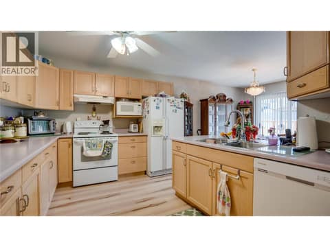 Functional Kitchen. at 3906 Pleasant Valley Road Unit# 23, Harwood, Vernon