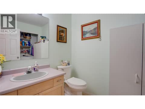 Main floor powder room at 3906 Pleasant Valley Road Unit# 23, Harwood, Vernon