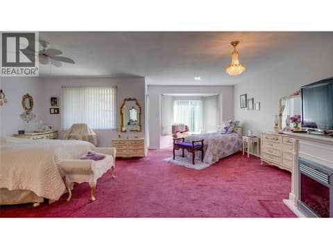 Spacious primary bedroom with bay window. at 3906 Pleasant Valley Road Unit# 23, Harwood, Vernon