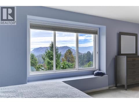 Valley views from the primary bedroom at 2280 Shannon Hills Drive, Shannon Lake, West Kelowna