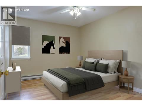 Virtually Staged Primary Bedroom at 505 Browne Road Unit# 103, City of Vernon