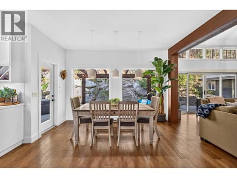 Dining area with direct access to the outdoor living space. at 178 Terrace Hill Court, Wilden, Kelowna