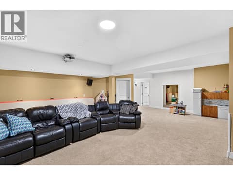 Expansive lower level recreation and media room with projector. at 178 Terrace Hill Court, Wilden, Kelowna