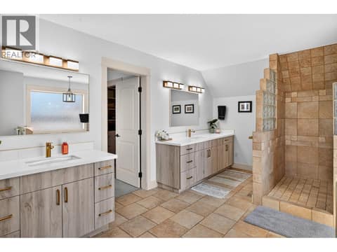 Spacious primary ensuite with dual vanities, heated floors, walk in shower and walk in closet. at 178 Terrace Hill Court, Wilden, Kelowna