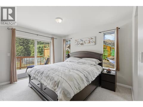 Main Floor Primary Bedroom at 7153 CAHILTY Road, Heffley, Kamloops