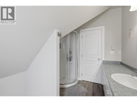 Upper Floor Main 3 Piece Bathroom at 7153 CAHILTY Road, Heffley, Kamloops