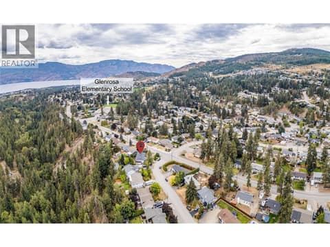 Home is in the center of the picture. Shows the proximity to Glen Canyon with hiking trails. And it's also within walking distance to Glenrosa Elementary School. at 3341 Webber Road, Glenrosa, West Kelowna