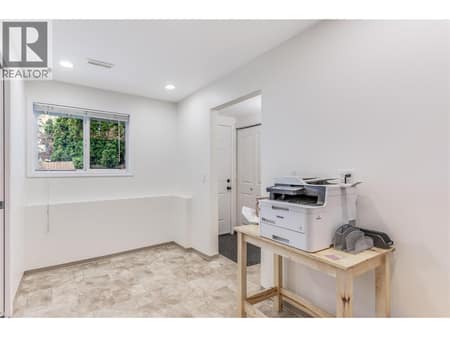 Mudroom/den leading to the backyard. at 3341 Webber Road, Glenrosa, West Kelowna