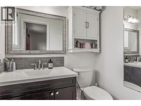 Primary bedroom 2-piece ensuite. at 3341 Webber Road, Glenrosa, West Kelowna