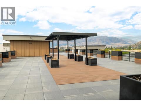 Amenities include a rooftop terrace. at 1925 Enterprise Way Unit# 406, Dilworth Mountain, Kelowna