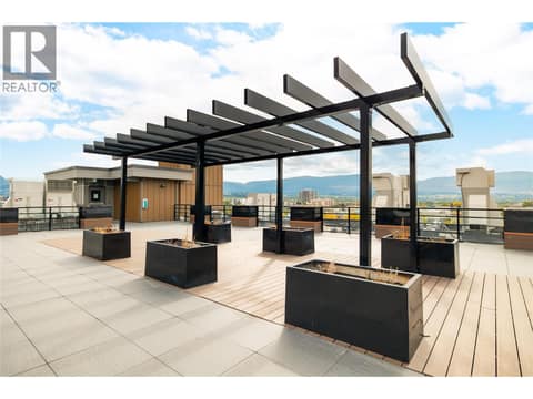 Amenities include a rooftop terrace. at 1925 Enterprise Way Unit# 406, Dilworth Mountain, Kelowna