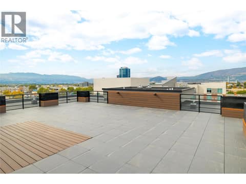Amenities include a rooftop terrace. at 1925 Enterprise Way Unit# 406, Dilworth Mountain, Kelowna