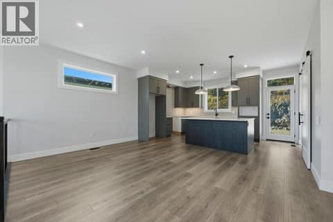 Dining and Kitchen at 2083 Cortina Drive, Black Mountain, Kelowna