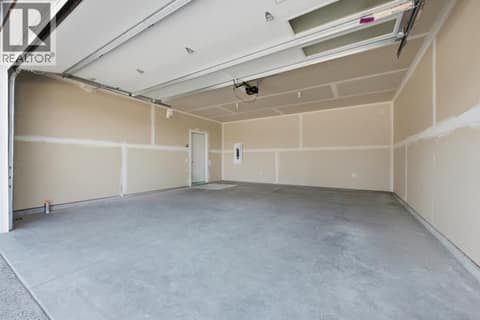 Double car garage at 2083 Cortina Drive, Black Mountain, Kelowna