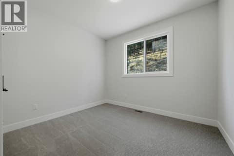 Secondary Bedroom #2 at 2083 Cortina Drive, Black Mountain, Kelowna