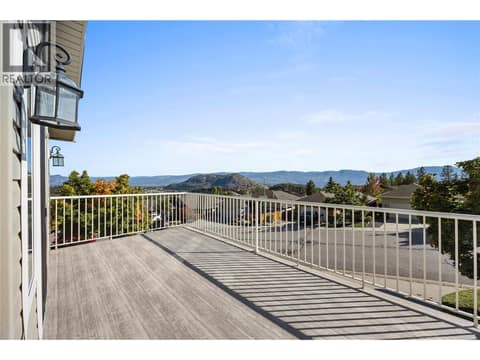 Enjoy views of Okanagan Lake and surrounding mountains from your deck and living room. at 2322 Shannon Heights Place, Shannon Lake, West Kelowna