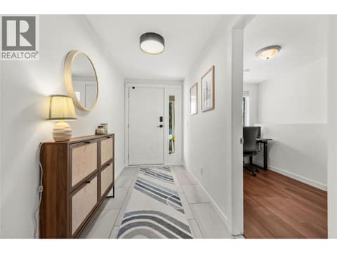 Foyer with office or den to the side. Easy access to the double car garage on this level. at 2322 Shannon Heights Place, Shannon Lake, West Kelowna