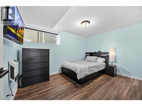 Main floor 4th bedroom with a 4PCE full bathroom. at 2322 Shannon Heights Place, Shannon Lake, West Kelowna